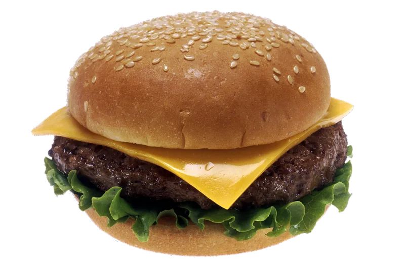 上下 の バンズ で 具材 を 挟んだ 一般的な チーズバーガー の 写真